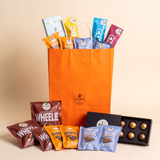 Gift Bag - Four of the Classics: the chocolates packed in the orange Vegan Chocolate Co gift bag